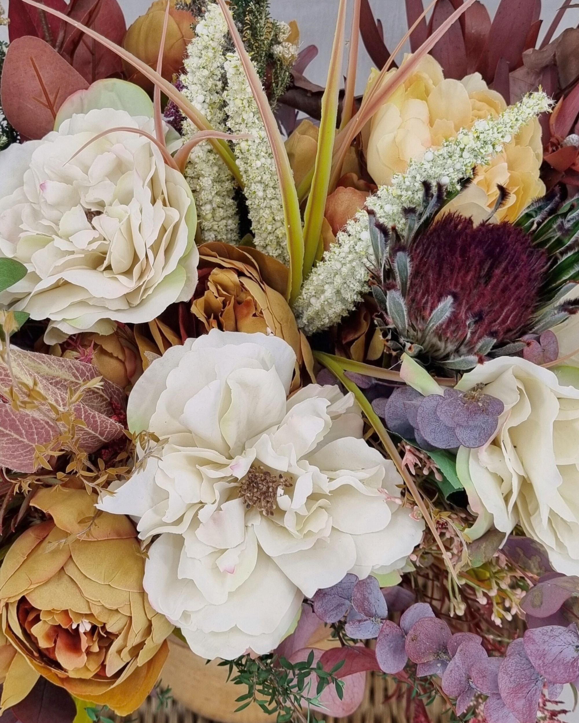 Close up of preserved foliage and earthy toned silk floral bouquet - Flowergirl NZ