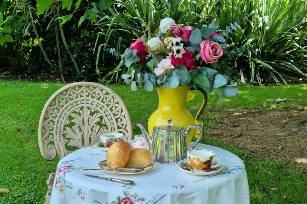 Large romatic flowergirl bouquet on outdoor table setting