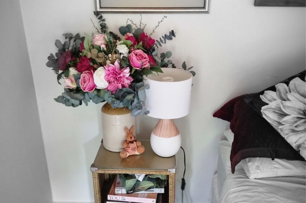 Large flowergirl romantic pink bouquet on bedside table